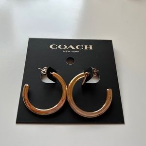 Coach rose gold tone earrings